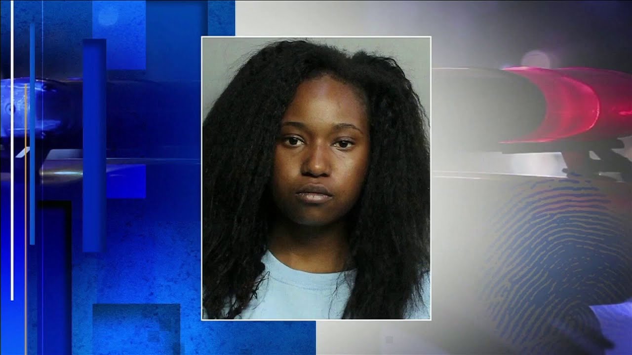 Woman booked into jail after being charged with running over police ...